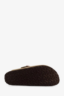Brown rubber sole with distinctive wavy tread pattern on birkenstock women’s boston bs leather mule brown