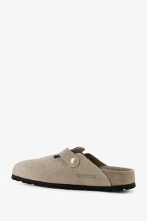 Birkenstock women’s Boston suede sandals beige with gold-tone button and black rubber sole front view