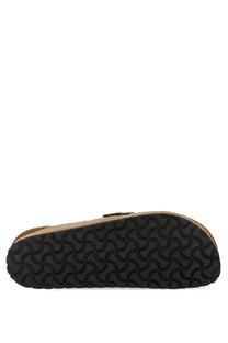 Birkenstock women’s buckley tan leather clog with shearling lining and black rubber sole with wavy tread pattern