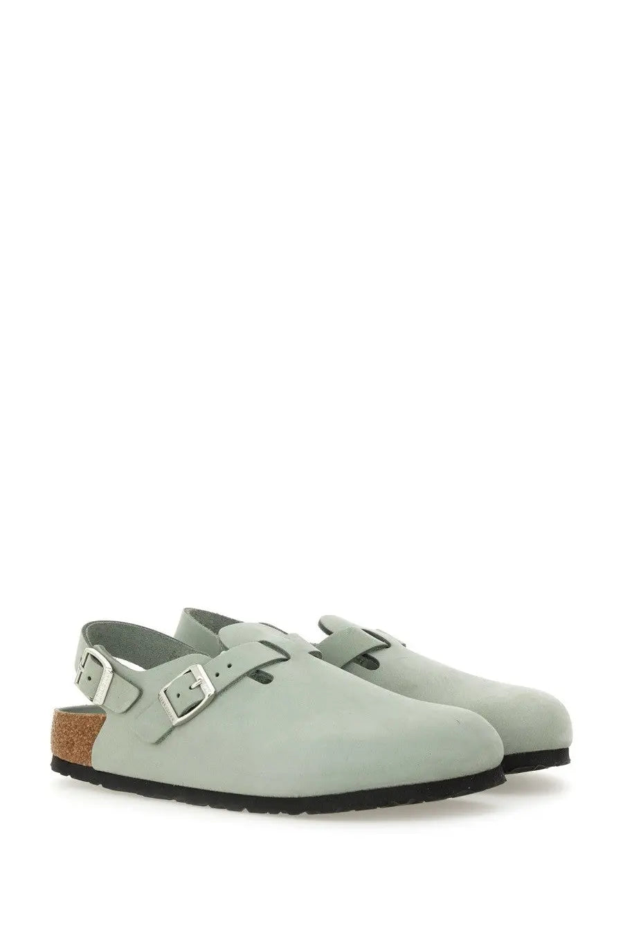 Light green suede birkenstock women’s sabot tokkio clog with silver buckle straps and cork footbed