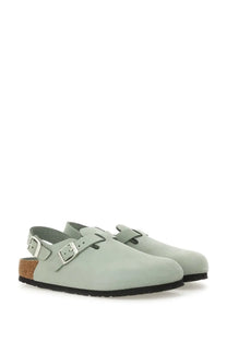Light green suede birkenstock women’s sabot tokkio clog with silver buckle straps and cork footbed