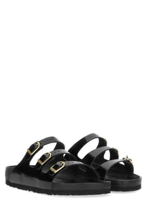 Birkenstock women’s sandal florida black with black patent leather and gold-tone buckle straps close-up front view