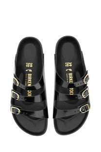 Birkenstock women’s sandal florida black featuring black patent leather and gold-tone buckle straps front view