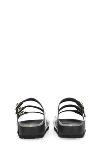 Birkenstock women’s sandal florida black with black and white straps and gold-tone buckles shown from the back side