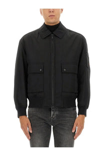 Boss men’s black bomber jacket with zipper closure and two front flap pockets in a sleek design