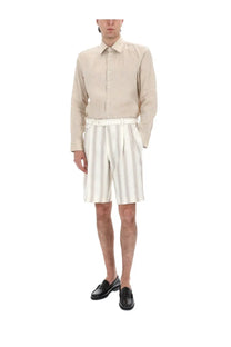 Beige linen button-down shirt with classic collar and long sleeves from BOSS men’s camicia in lino beige collection