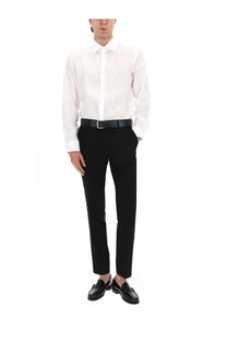 Black tailored trousers with a sleek straight-leg cut and subtle creasing at the waistband for boss men’s camicia in lino white