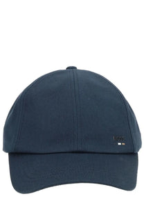 Dark navy blue cotton baseball cap with textured weave and boss logo embroidered on the front for men
