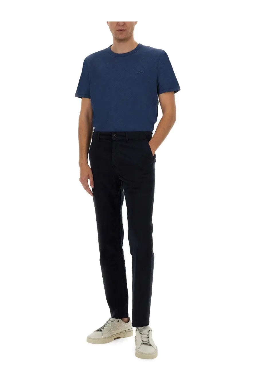 Navy blue short-sleeved crew neck t-shirt paired with blue BOSS men’s chino pants in breathable cotton blend