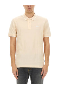 BOSS men’s cream-colored cotton polo shirt with short sleeves and subtle embroidered logo on the chest