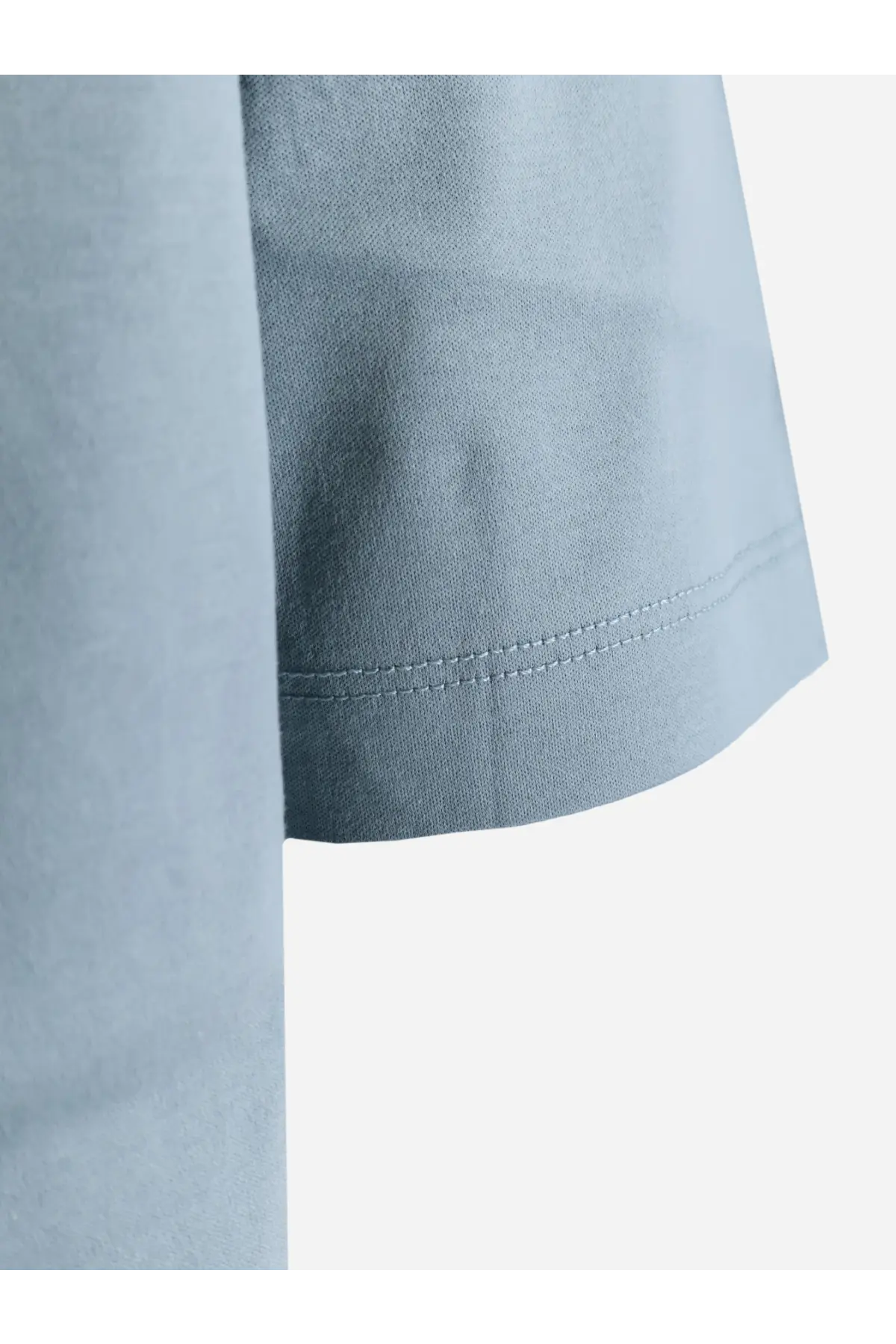 BOSS men’s cotton shirt blue featuring a light blue short-sleeved design with a neatly stitched hem