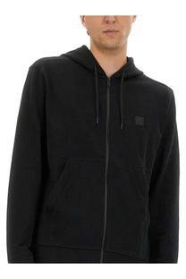 Boss men’s black cotton zip-up hoodie with subtle textured chest patch and matching drawstrings