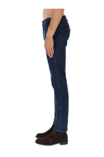 Dark blue slim-fit denim jeans with classic five-pocket design and subtle thigh fading by BOSS men’s Delaware jeans