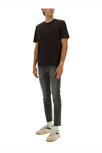 Black short-sleeved crew neck t-shirt paired with boss men’s delaware slim fit grey jeans for casual wear