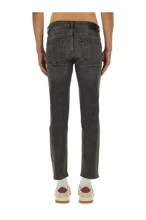 Dark gray slim fit denim jeans with straight leg cut and classic back pockets shown from the back by BOSS Men