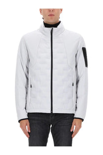 BOSS men’s white quilted down hybrid puffer jacket with black zipper and sleeve patch for cold weather wear