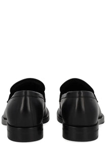Boss men’s dressletic black leather loafers with sleek minimalist design and sturdy soles for dressy occasions