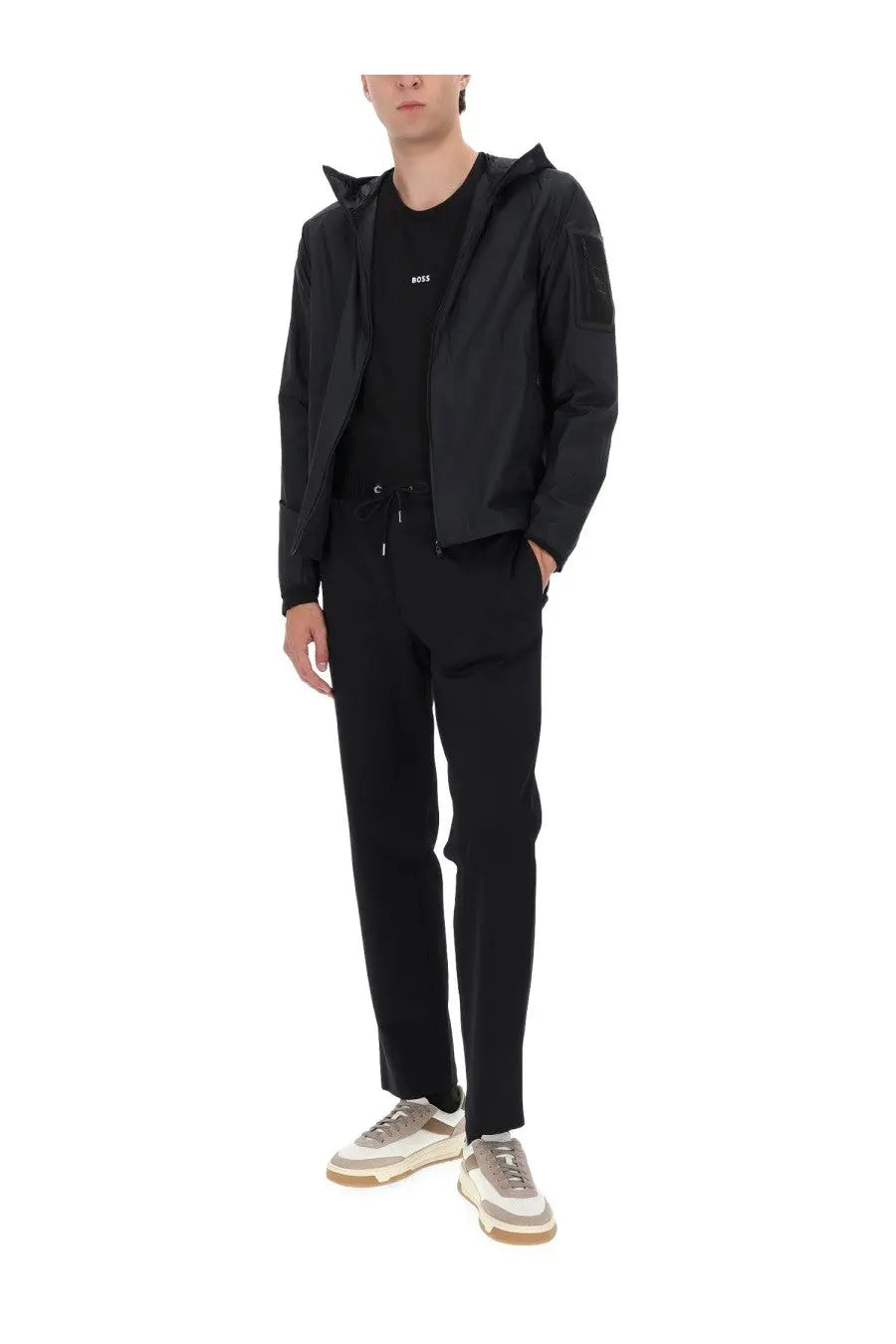 Black Hugo Boss hooded jacket with subtle chest branding and sleek modern design from BOSS Men’s Airnix Blue line