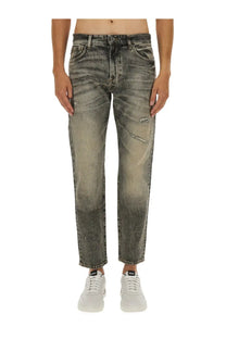 Boss men’s distressed gray denim jeans with a faded worn-in look and subtle fading along the legs