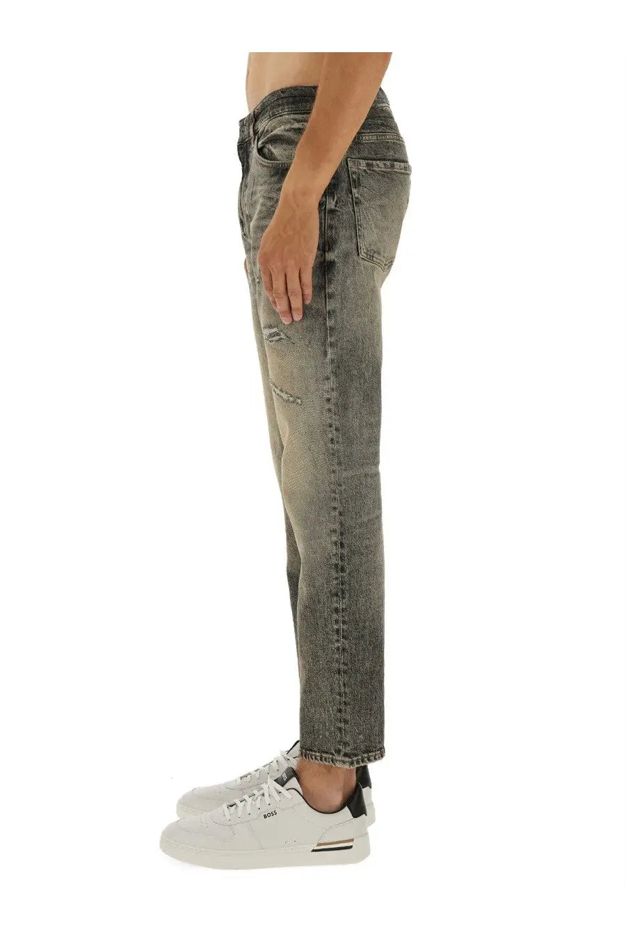 BOSS men’s distressed gray denim jeans with a faded worn-in look and subtle tear details in denim grey