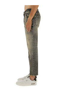 BOSS men’s distressed gray denim jeans with a faded worn-in look and subtle tear details in denim grey