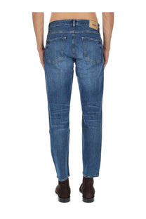 Blue denim jeans with classic five-pocket design and brown leather brand patch at waistband by BOSS men’s jeans Maine blue