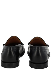 BOSS men’s black leather loafer with polished finish and contrasting brown lining for stylish comfort