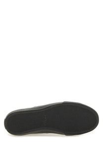 Black rubber sole with textured grip pattern on boss men’s leather sneaker black