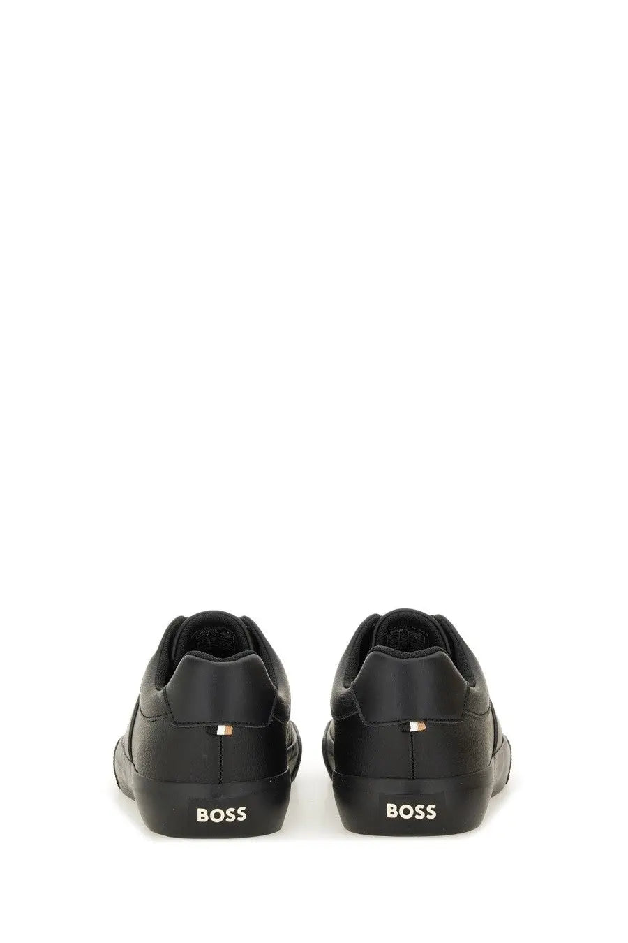 Black leather boss men’s sneaker with sleek minimalist design and subtle gold-tone branding on the heel back side