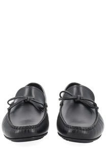 BOSS men’s moccasin black leather loafers with polished finish and matching black leather bow ties