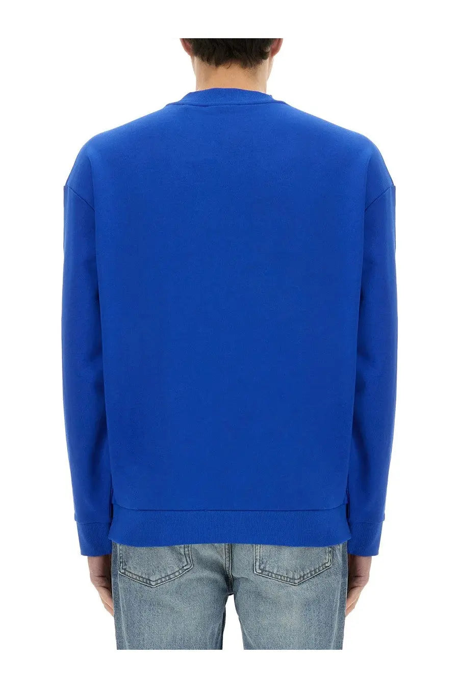 A vibrant royal blue boss men’s niero crewneck sweatshirt with smooth fabric and ribbed cuffs