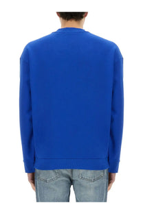 A vibrant royal blue boss men’s niero crewneck sweatshirt with smooth fabric and ribbed cuffs