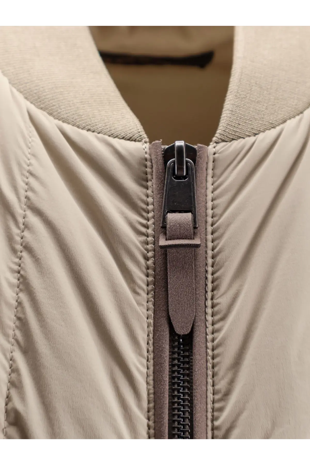 BOSS men’s beige nylon sleeveless quilted bomber jacket with dark gray zipper pull and matching suede tab