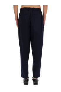 Dark navy wool BOSS men’s formal pants with relaxed fit and elastic waistband for comfortable wear