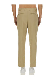 BOSS men’s beige chino trousers with tailored fit and subtle stitching details for a polished look