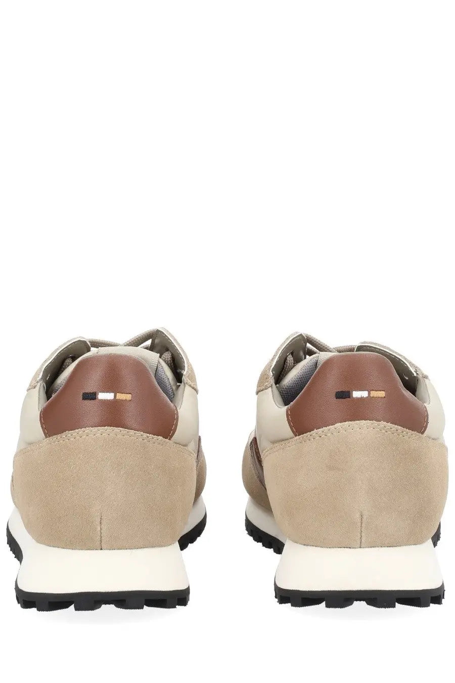 Beige and brown suede boss men’s parkour sneaker with white rubber sole and black tread shown from the back side