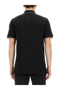 BOSS men’s black short-sleeved polo shirt featuring subtle gray trim on collar and sleeve cuffs