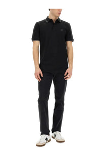 BOSS men’s black short-sleeved polo shirt with subtle contrast collar and sleeve trim featuring a small logo