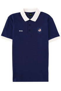 Boss men’s polo paddy blue navy blue shirt with white collar and sleeve trim featuring shield shaped american flag patch