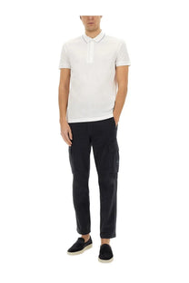 BOSS men’s polo Paule white short-sleeved shirt with subtle textured weave and dark trim collar