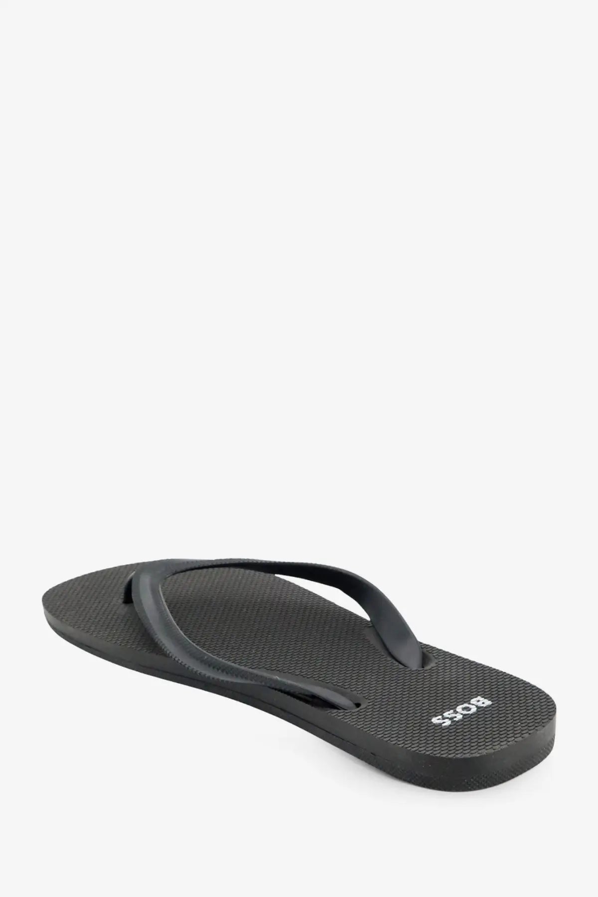 Black rubber BOSS men’s flip-flop sandal with textured sole and white logo on the heel back side