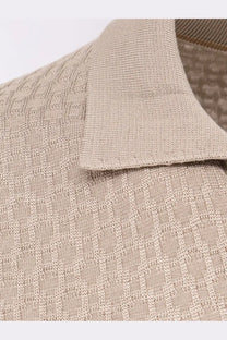 Beige knitted polo shirt by boss featuring a textured interlocking diamond pattern and ribbed collar in silk blend