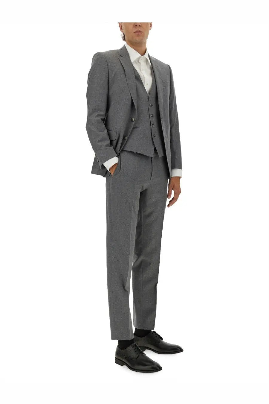 BOSS men’s slim fit vest grey shown with tailored gray three-piece suit featuring structured blazer and slim-fit trousers