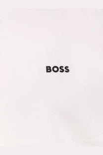 Black boss logo on white stretch cotton fabric of boss men’s casual shirt close-up detail
