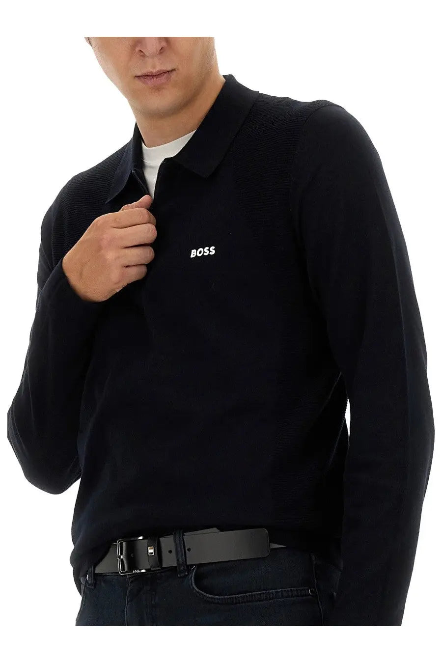 Black knit polo shirt with subtle textured pattern and white boss logo embroidered on left chest for men