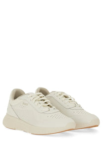 Cream-colored leather BOSS men’s Titanis sneaker with minimalist design and perforated detailing in white