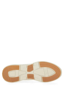 Cream-colored and tan rubber sole with geometric tread pattern on the boss men’s titanis sneaker white