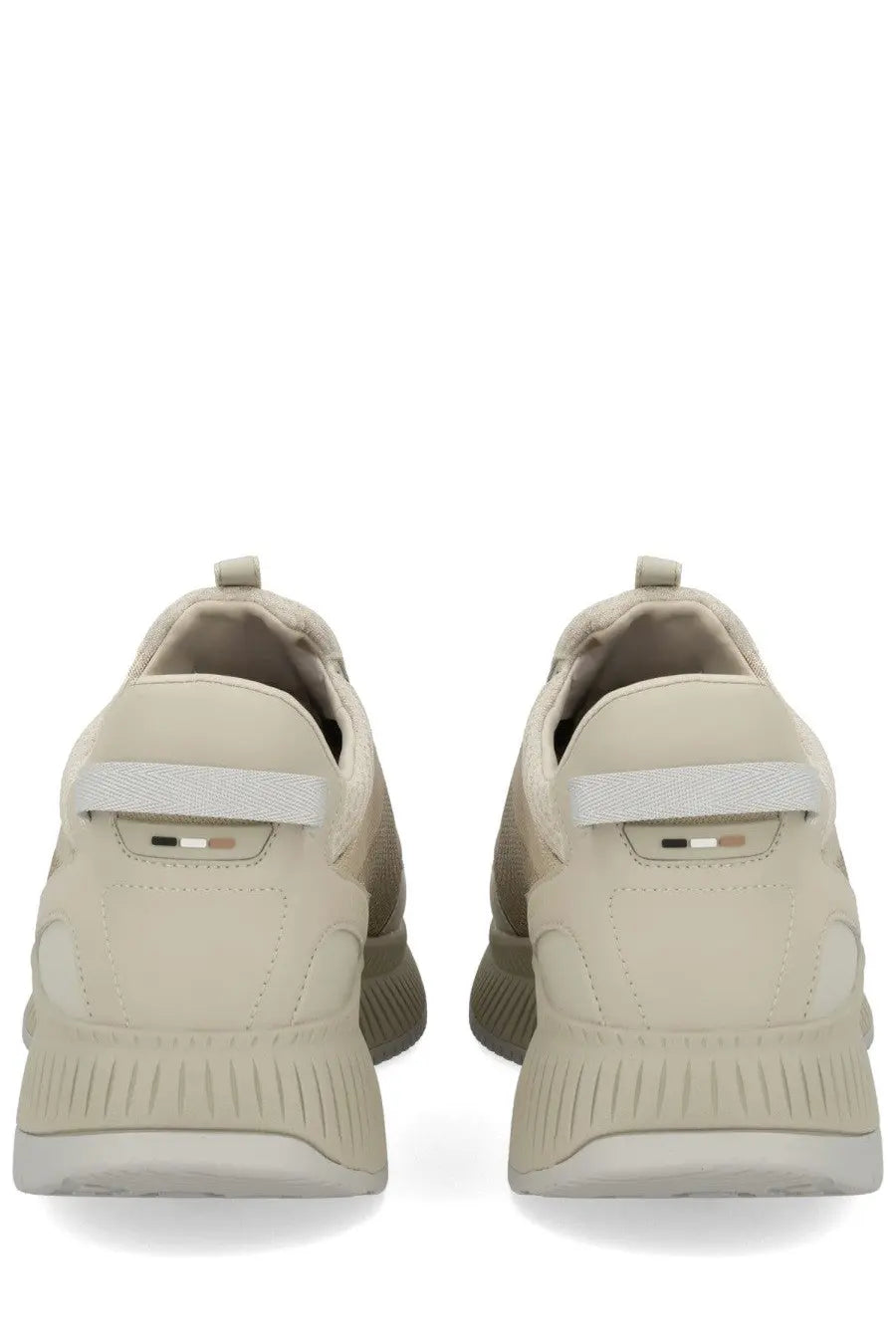 Beige boss men’s ttnm evo slip-on sneakers with textured upper and subtle branding detail on the heel back side