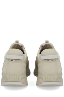 Beige boss men’s ttnm evo slip-on sneakers with textured upper and subtle branding detail on the heel back side