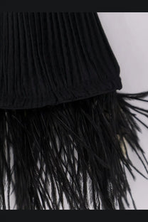 BOSS women’s Efedera pleated black top with fringe of black feathers made from lightweight fabric